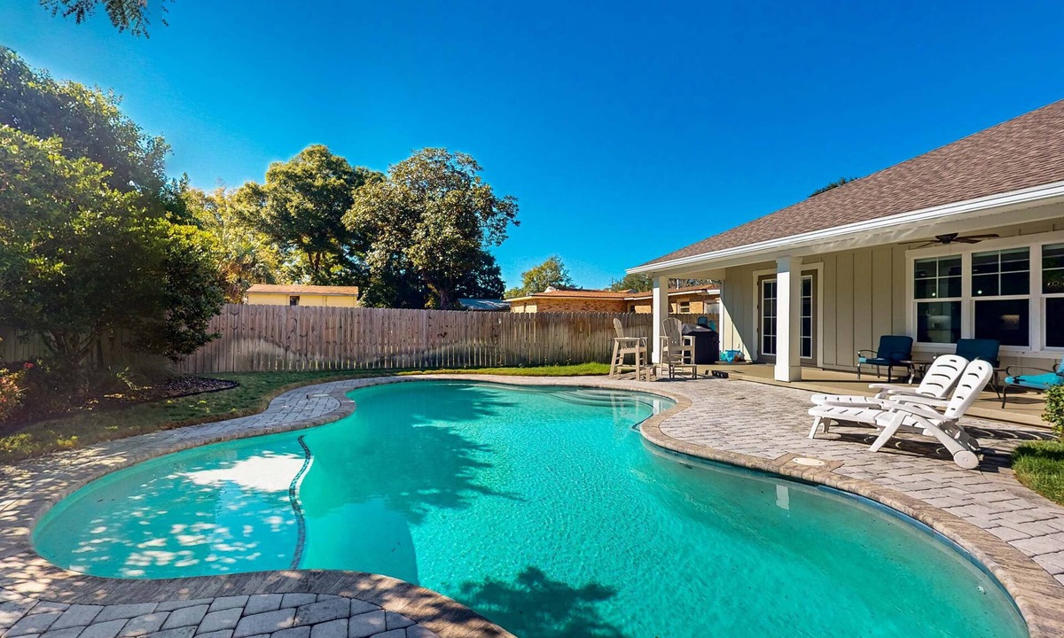 Southeast Pensacola House | Contemporary dog-friendly retreat with pool & patio - near shops & attractions