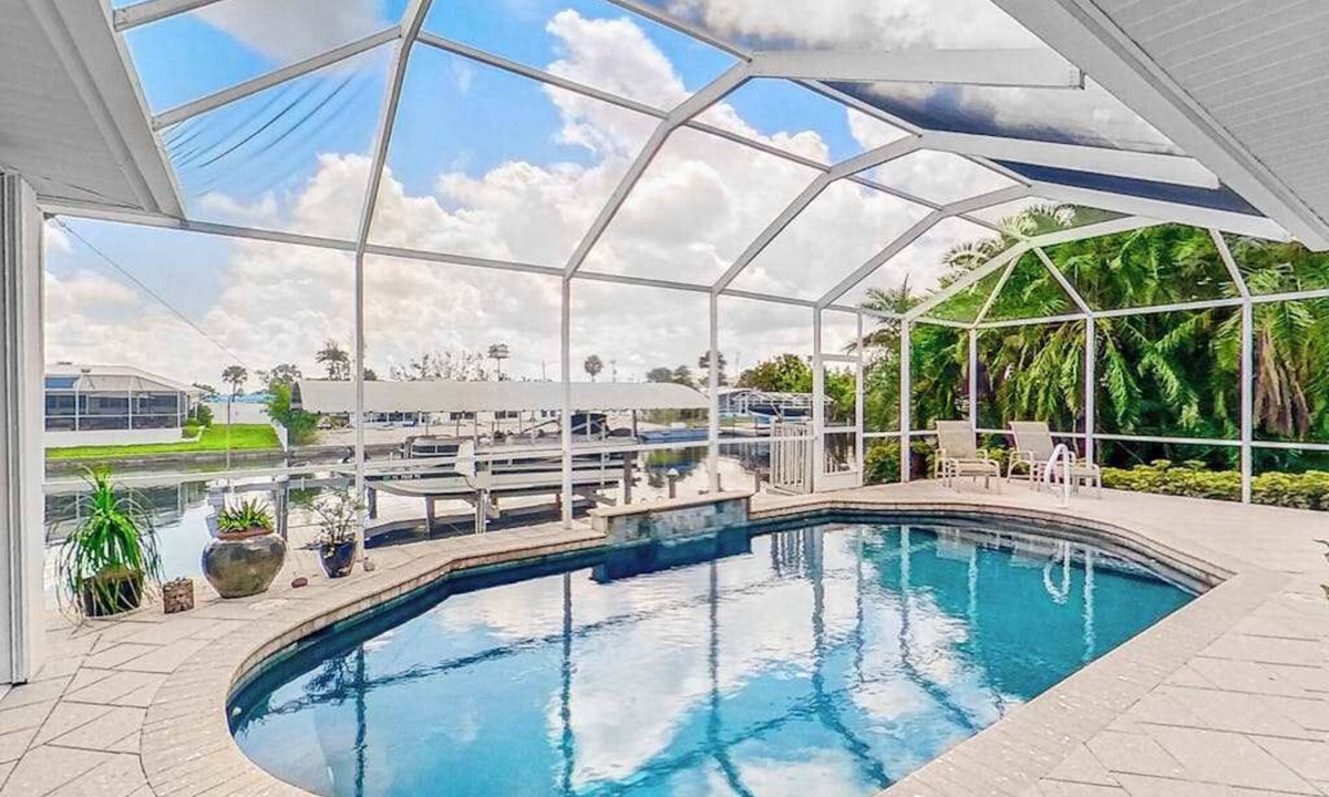Matlacha Isles House | Dog-friendly waterfront home with heated pool, lanai, central AC, & W/D