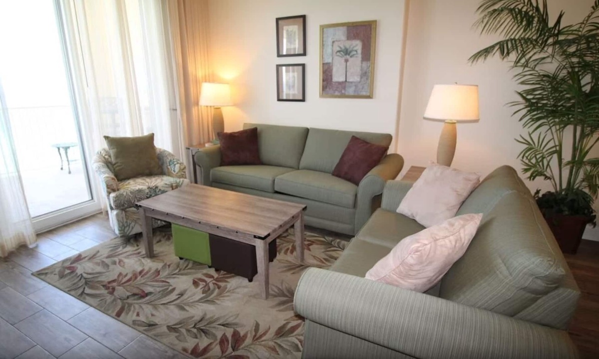 West Panama City Beach Condo | Emerald Isle 1406 - Front row beach chair service included! Affordable rates!
