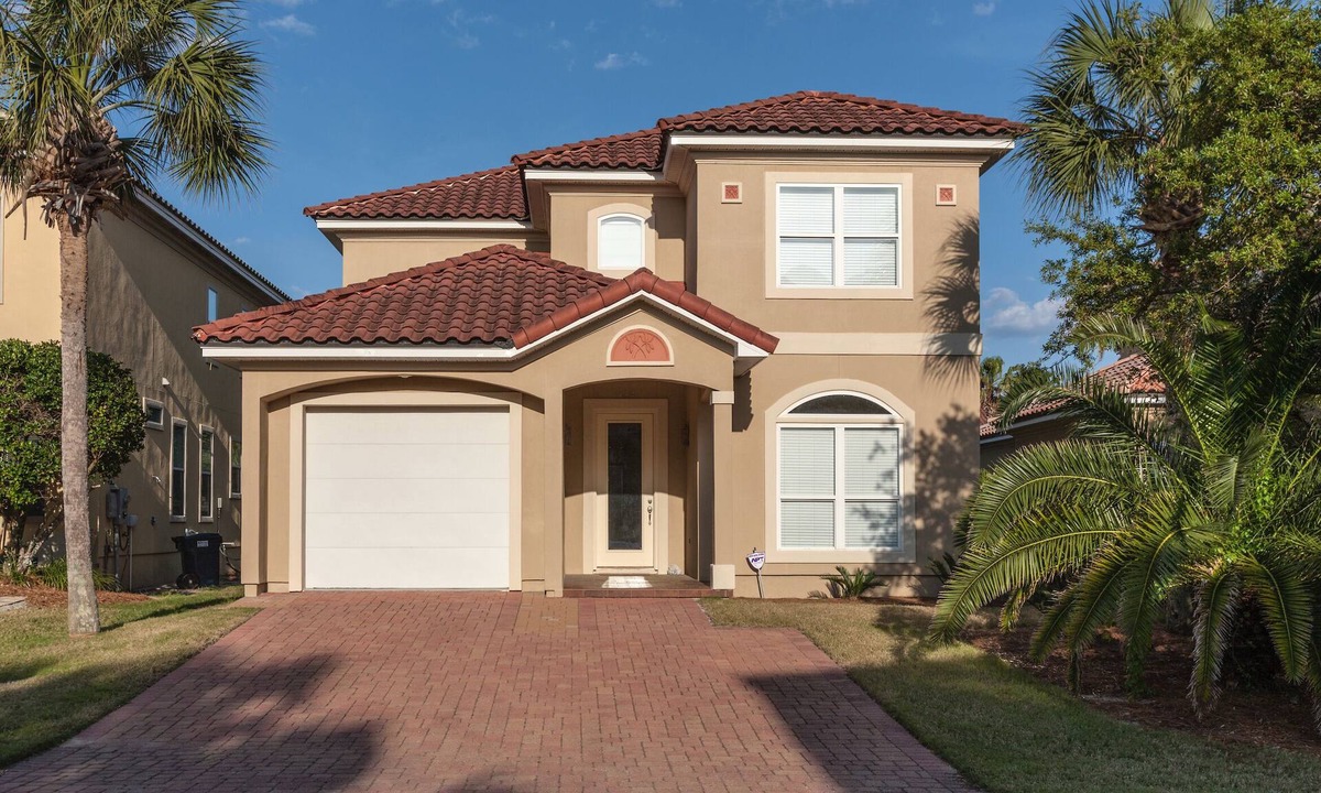 Fort Bay House | Exclusive private home in gated community across the street from the beach.