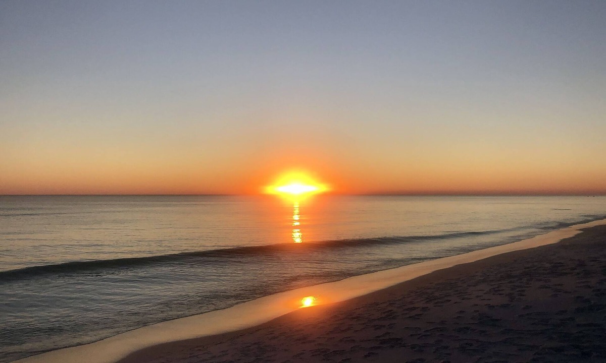 Gulf Place Condo | First floor condo overlooking the heated pool. Steps from the private beach!