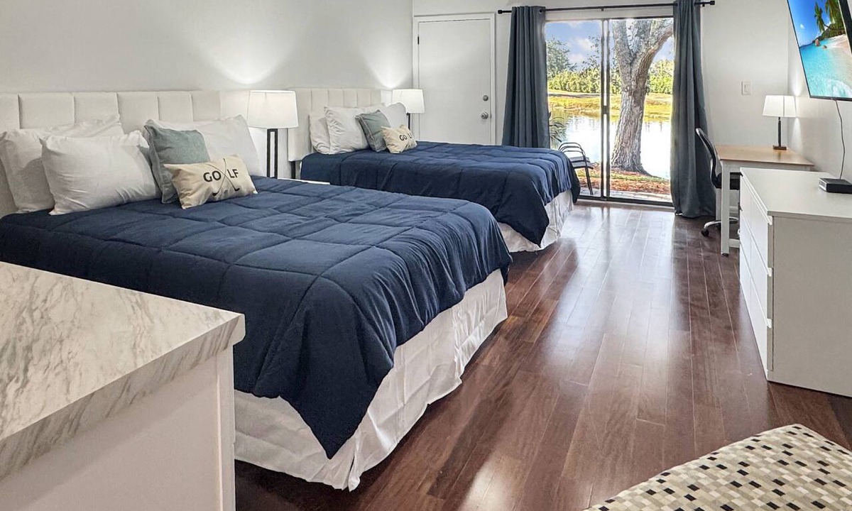Wesley Chapel Condo | Ground Floor Waterfront Studio | 2 Queen Beds | Private Patio | Optional Saddlebrook Amenities