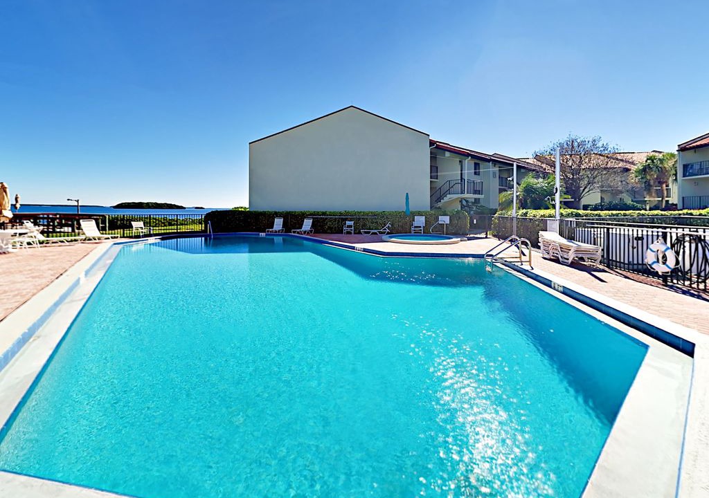 Tierra Verde Apartment | Holiday Island 2BR w/ Pool, Hot Tub, Tennis, Fitness Center, Dock & Grill!