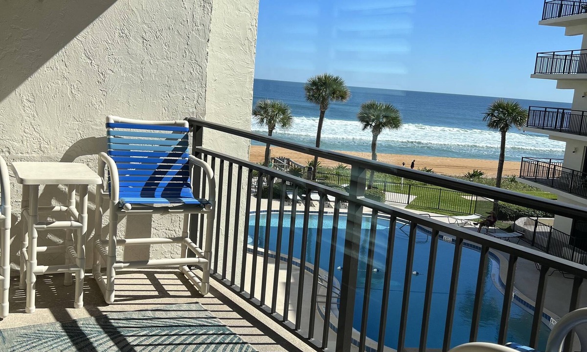 Sunny Shores Condo | Indies House Sought After Beachfront Condo w Pool near shopping and restaurants