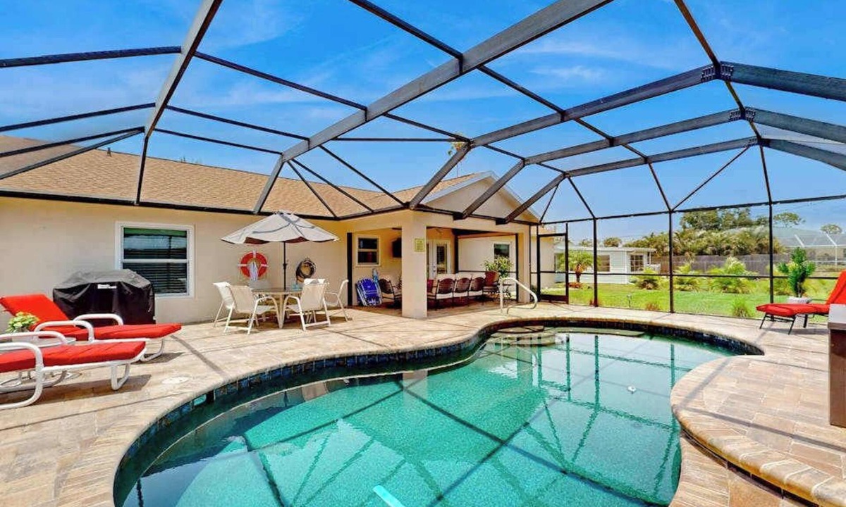 Englewood East House | Inviting home w/screened pool, lovely patio & upgraded interior - beach nearby