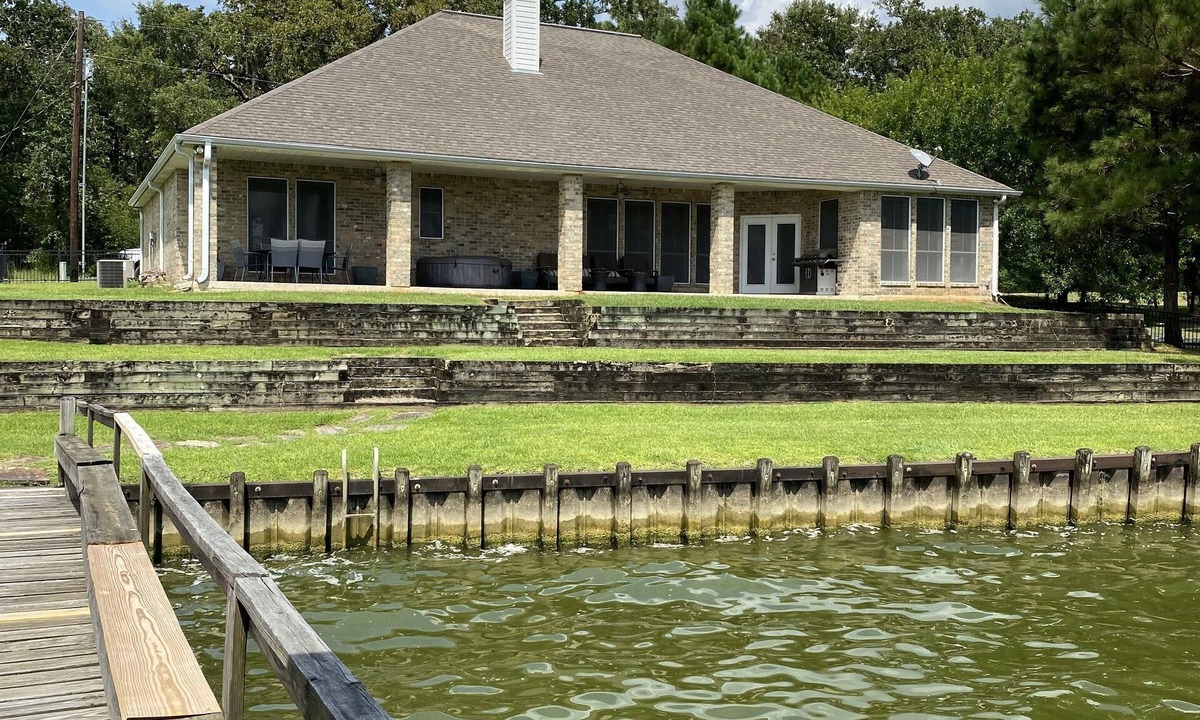West Livingston House | Lake front property on 3 acres offering privacy and never ending views.