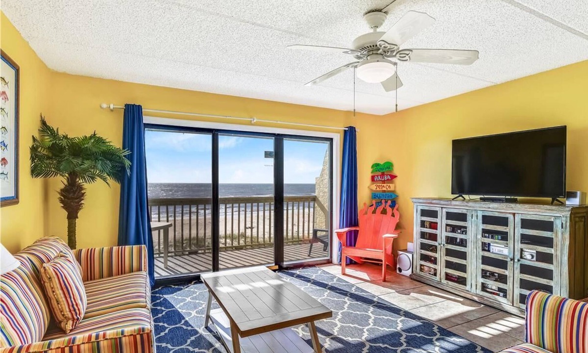 St. George Island Condo | Located right on the beachfront, this bright, cheerful and beautiful well-appointed Villa.
