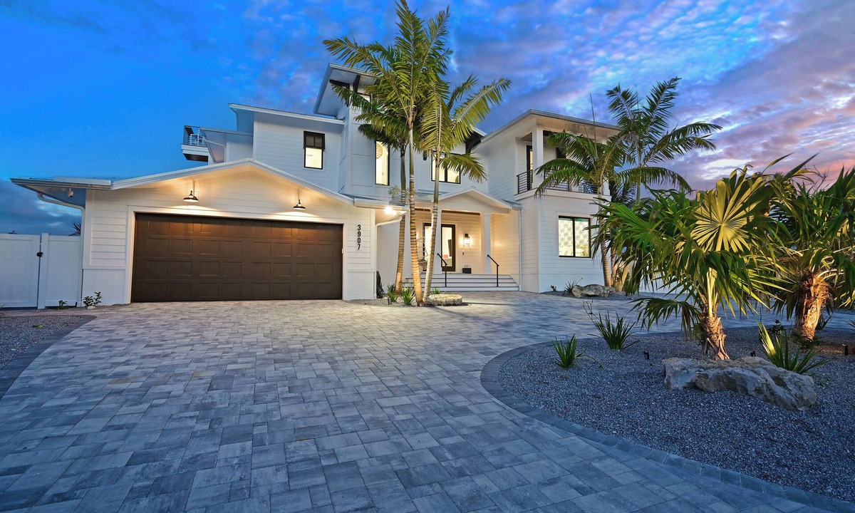 Whitney Beach House | Luxe Waterfront Canal Home w Heated Pool & Spa Rooftop Deck Outdoor Kitchen Golf