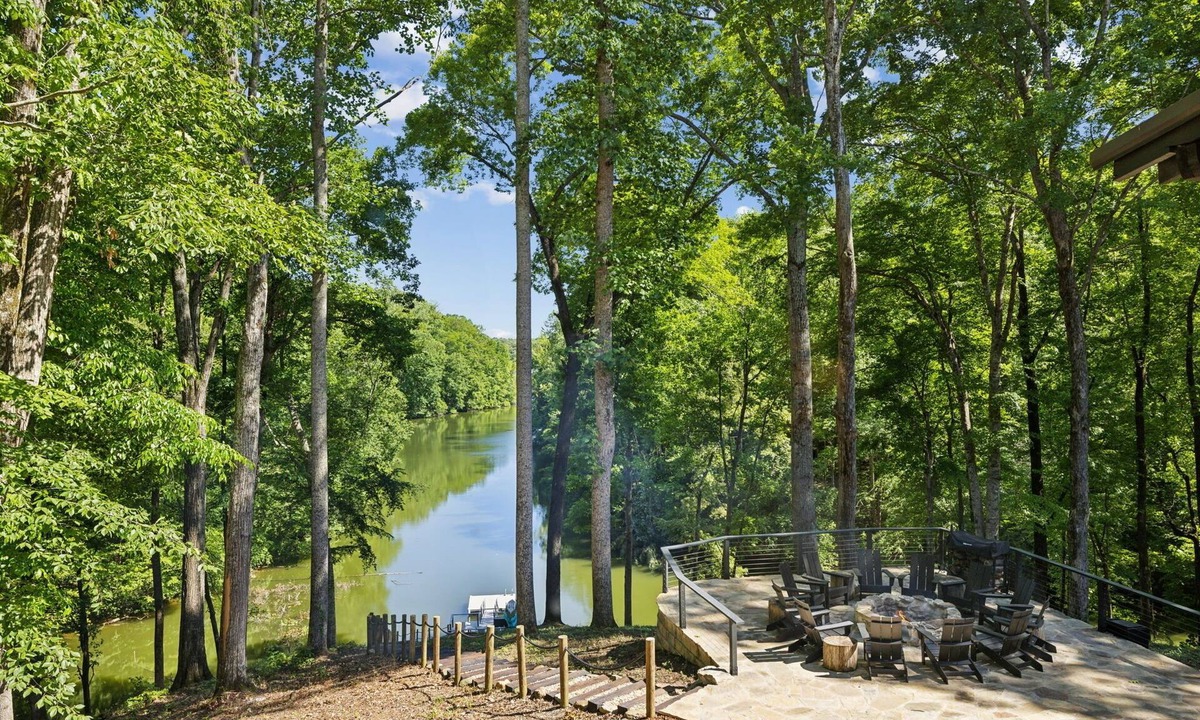 Estill Springs House | Luxury Lakehouse on Tims Ford Lake in Secluded Cove with Private Dock.