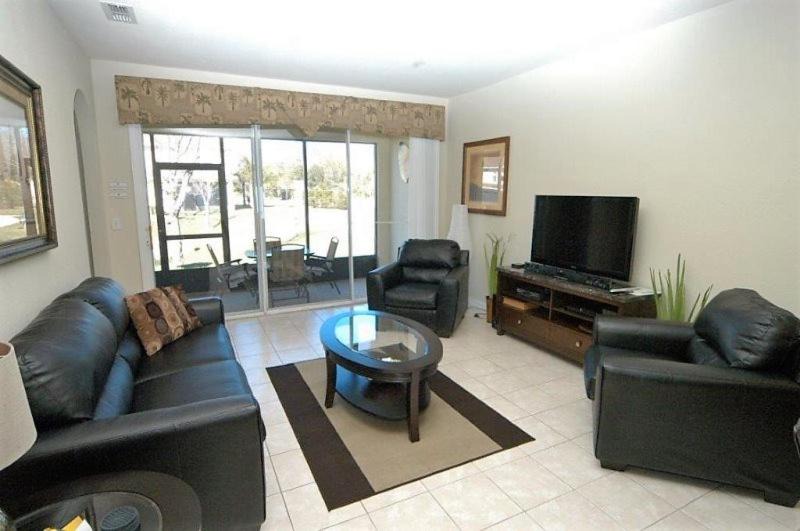 Trafalgar Village House | Modern 3 Bedroom 3 Bath Town Home In Trafalgar Village Resort