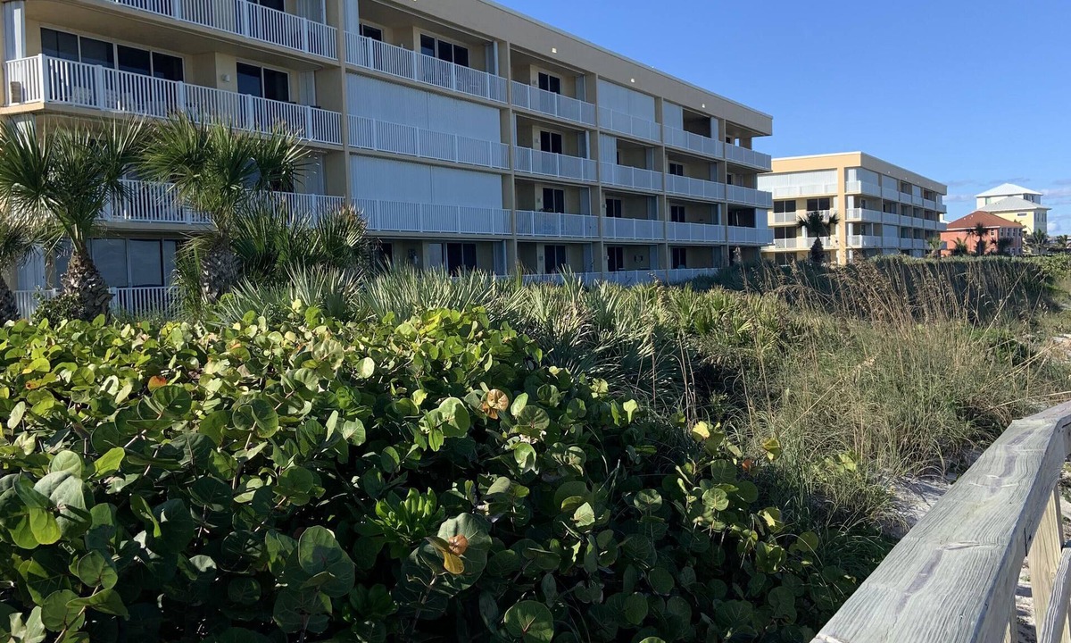 Indian Harbour Beach Condo | Ocean front TOP FLOOR Condo with wrap around deck