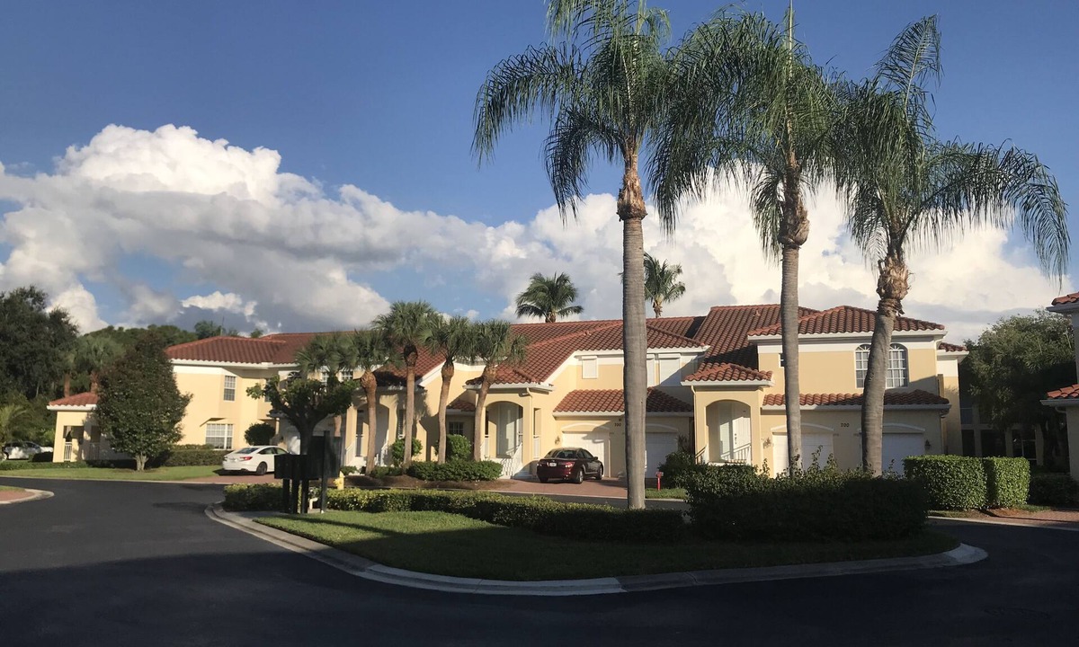 Pelican Bay Condo | Pelican Bay, Lambiance Garden Condo, second floor with full lake western view.
