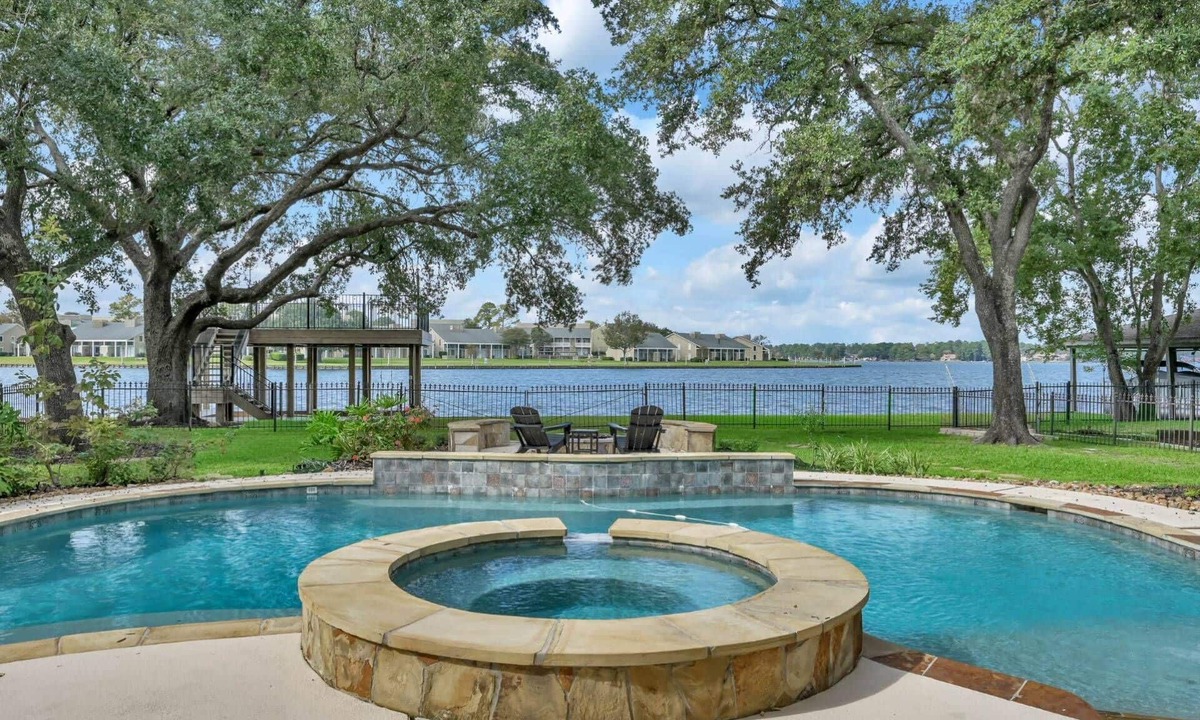 April Sound House | Pool & Spa | Lux Waterfront Home | 2 Primary Suites, 4 BR, Boat Dock & Views