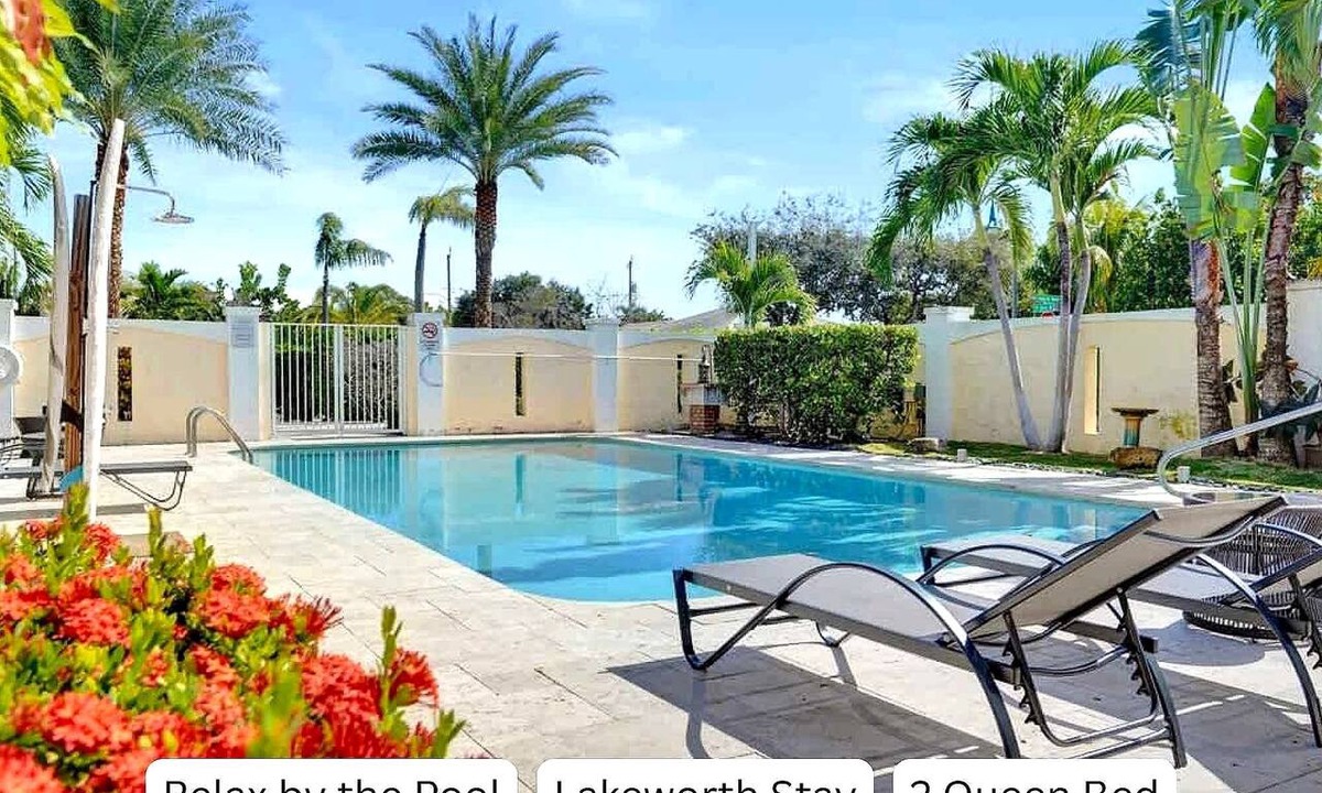 Mango Groves Apartment | Poolside Suite in Lake Worth | 2 Queen Beds