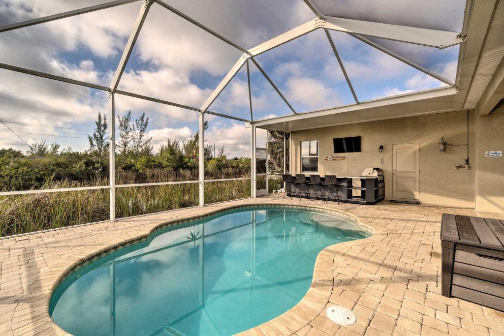 South Gulf Cove House | Port Charlotte Canalfront Home w/Pool & Dry Bar!