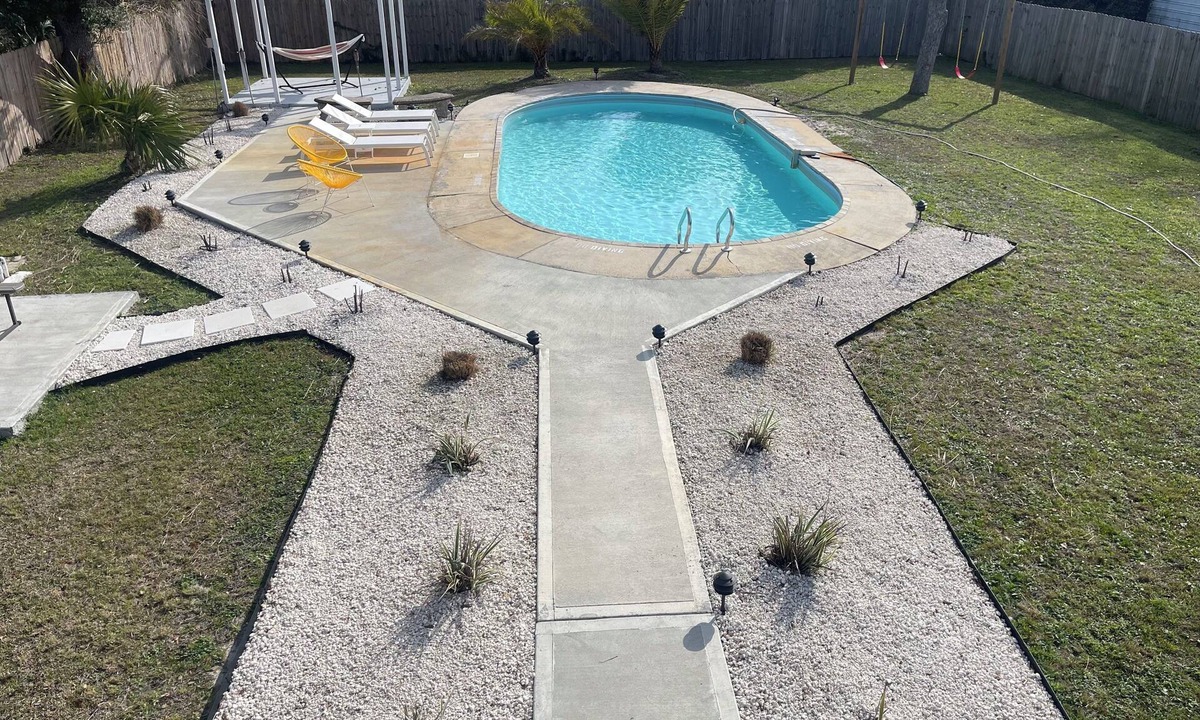 Pretty Bayou House | Private Bungalow with pool across the street from bay! 5 min drive to the beach.
