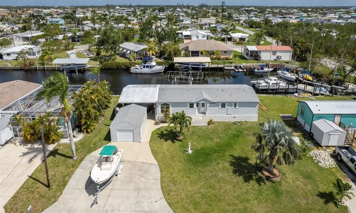 Charlotte Park House | Relax at 710 El Dorado Dr, canal waterfront property with private dock