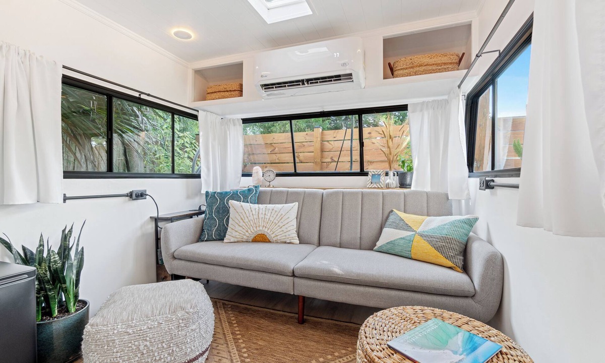 Navy Point House | Renovated 1970’s retro camper on Bayou Grande in Pensacola with walking trail.