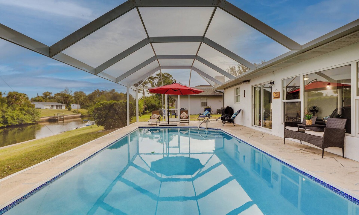 Port Charlotte Cottage | Riverfront Florida Retreat w/Pool, Patio & Grill!