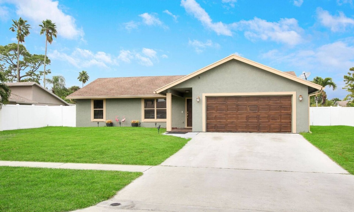 Royal Palm Beach House | Royal Palm 4BR Oasis- Tranquil Patio, Prime Location