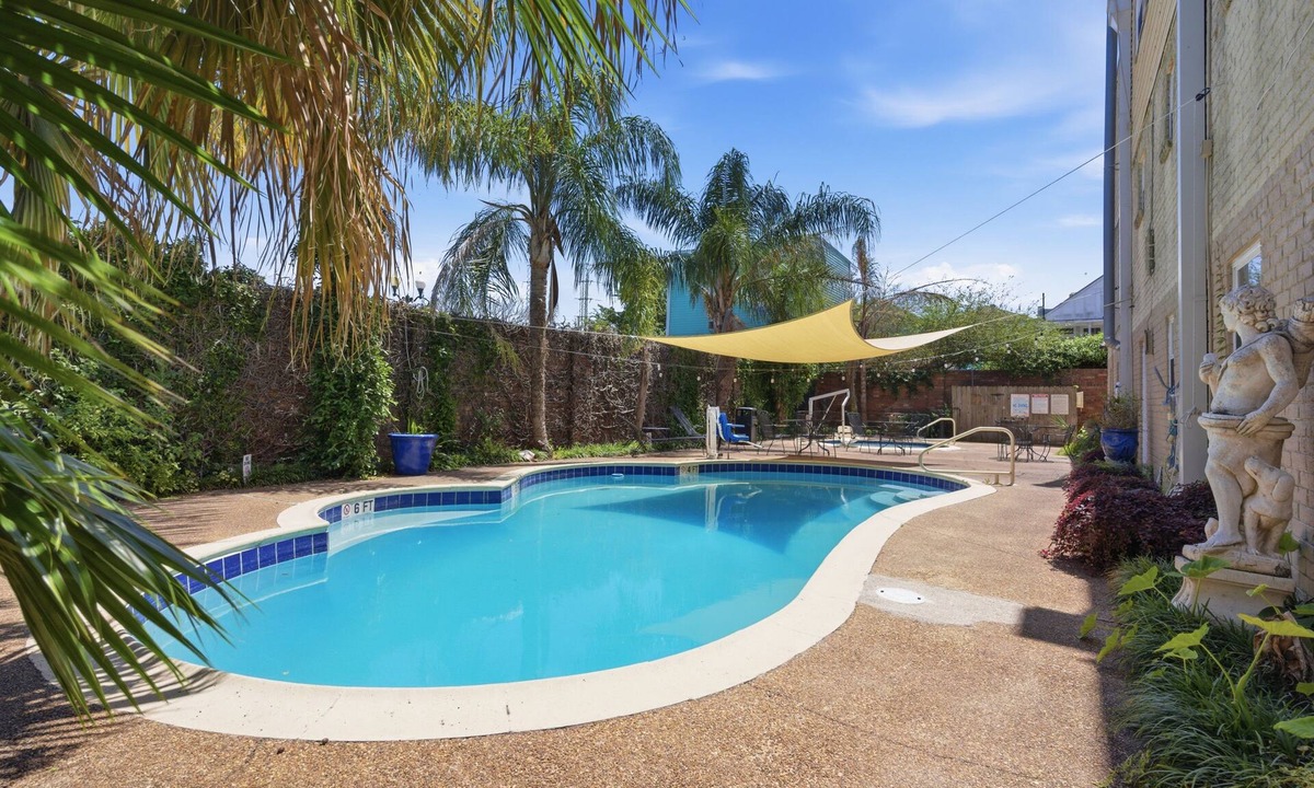 Faubourg Marigny Apartment | Spacious 8BR Frenchmen Street stay with pool, hot tub, parking, and easy access to the French Quarter and live music.
