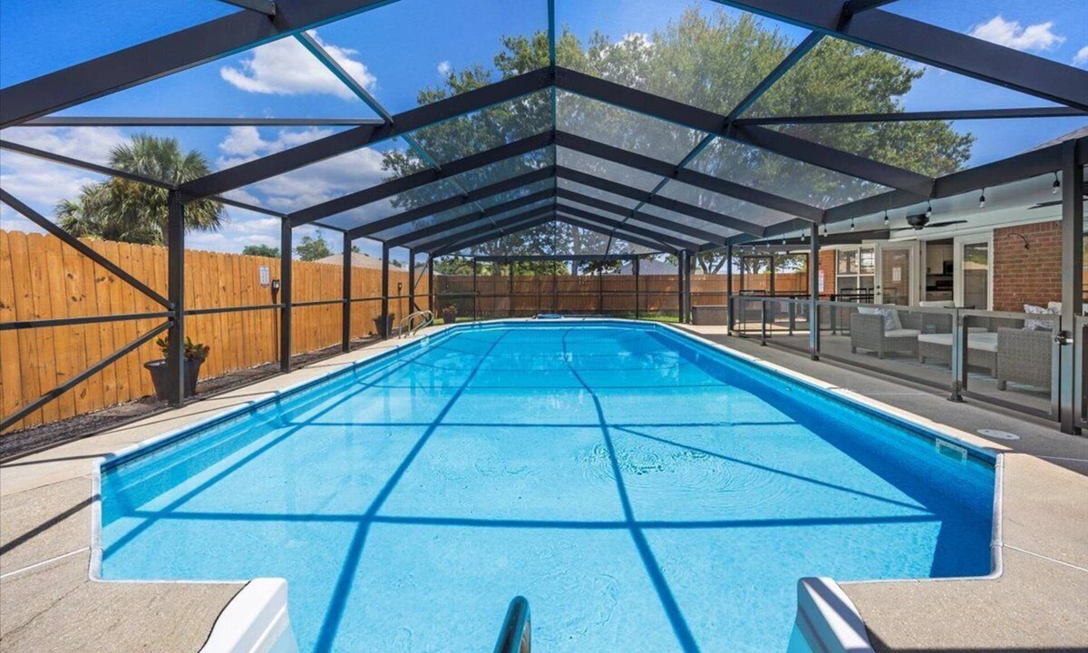 Ono Island House | Spacious Family Fun House: Large Private Screened in Pool, Game & Bunk Room