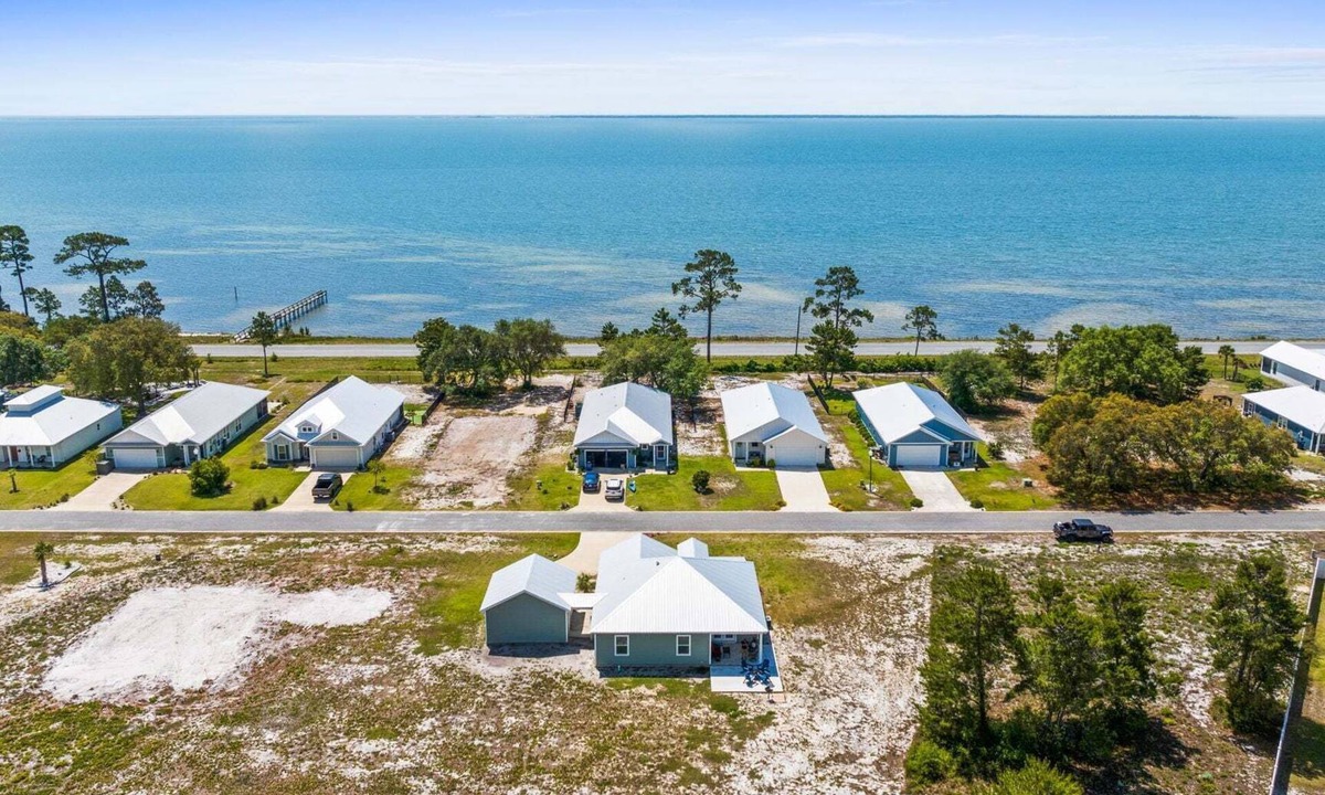 Eastpoint House | St. George Sound Home Pool, Game Room, Fire Pit, Steps to Water – Forgotten Coast Escape