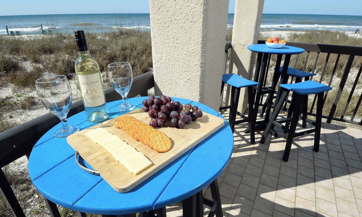 Sunnyside Condo | Steps to sand with wraparound gulf-front balcony