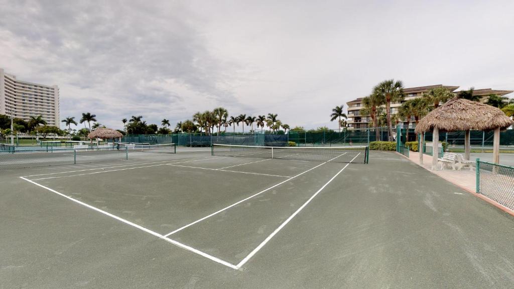 Marco Island House | Updated 2 Bed Condo Offering Long Beach Views From Balcony