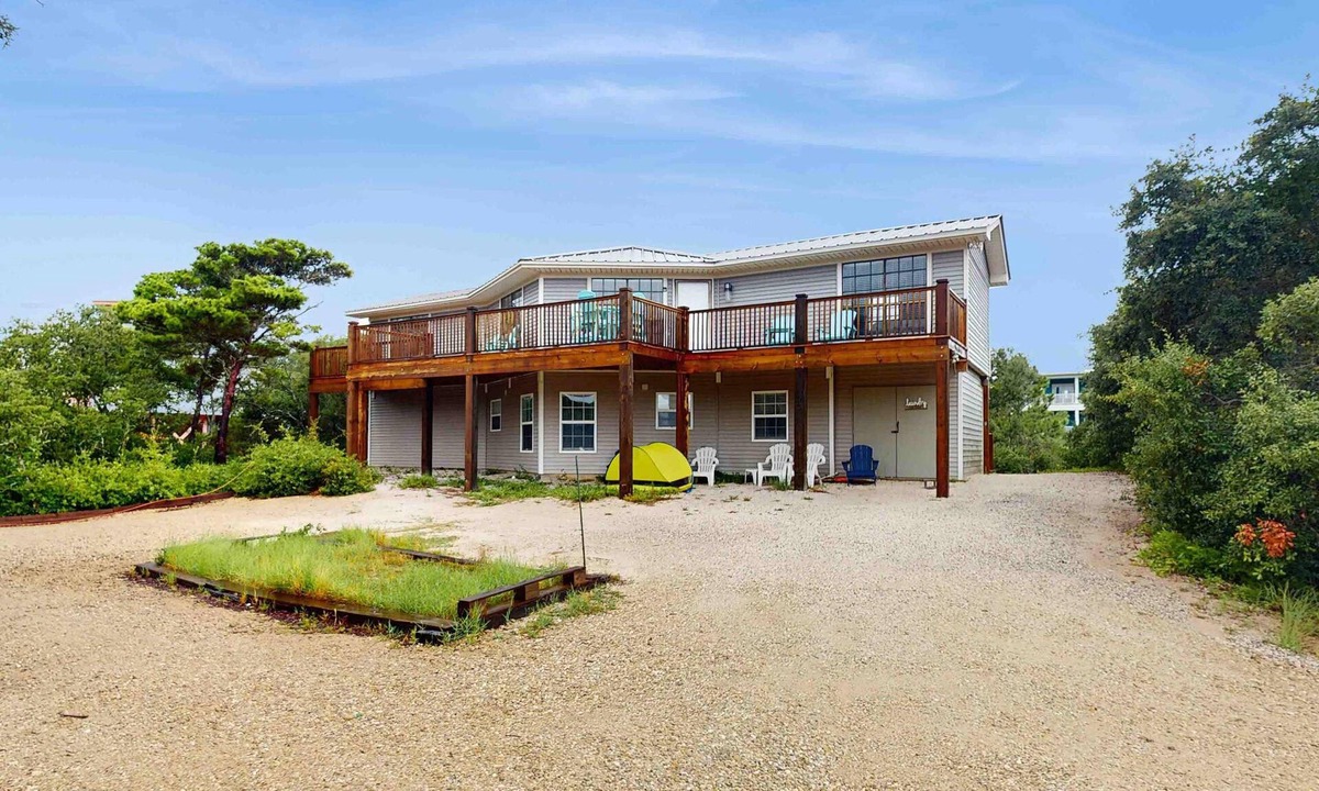 Surf Side Shores Condo | Upstairs duplex near the beach with deck, outdoor shower, W/D, streaming, & AC
