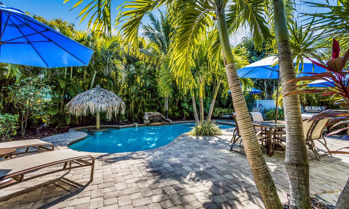 Holmes Beach Cottage | Vibrant Island Retreat with Pool, Tiki Table and Walk to Beach