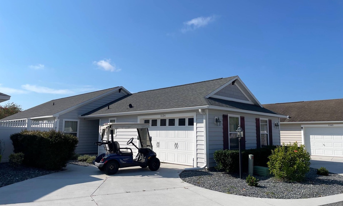 Lake Sumter Landing House | Walking distance to Lake Sumter Landing! Small Dog Friendly Villa w/Golf Cart