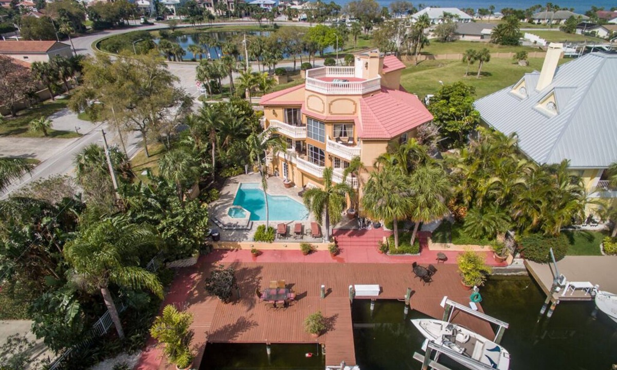 Schooner Place House | Waterfront Home - Pool, Boat Dock, Roof Top Patio, Piano, Game Room, Pin Ball