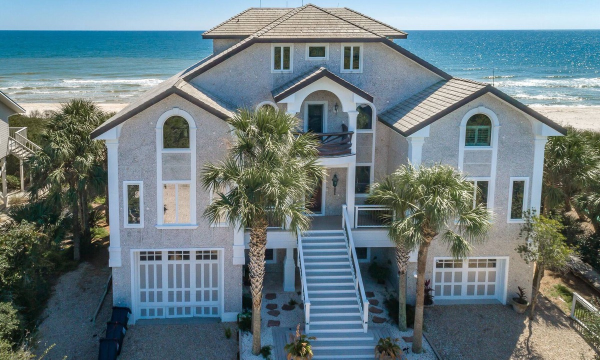 Plantation House | Welcome to Hidden Gem this stunning beachfront home is located in the gated community of the Plantation. Boasting 5 bedrooms and 5 bathrooms this home is perfect for large families that enjoy their own space.
