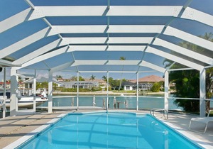 Delightful waterfront home w/ heated pool & direct boating access