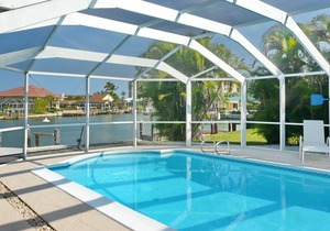Delightful waterfront home w/ heated pool & direct boating access