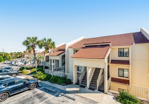 Gorgeous and cozy beachfront condo with shared pool and beach access