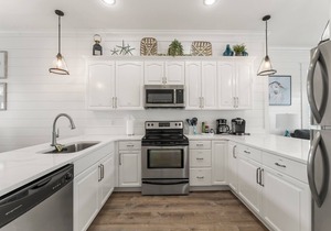 Newly remodeled! Only steps to the beach! Private Pool!