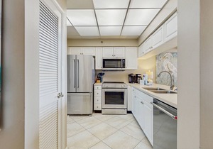 Open-concept beachfront home with balcony, lagoon pool, beach access, pickleball