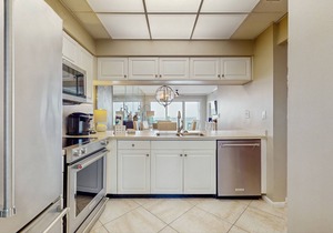 Open-concept beachfront home with balcony, lagoon pool, beach access, pickleball