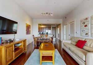 Polished condo with balcony & pools - one block from the beach
