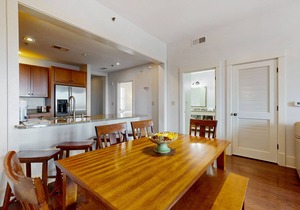 Polished condo with balcony & pools - one block from the beach
