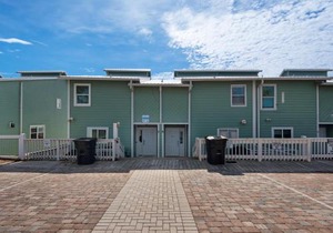 Quiet Surf Townhomes II #5 by Newman-Dailey