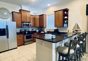 Remodeled 3 BR/2BA condo steps to the beach! Sunset views and private garage.