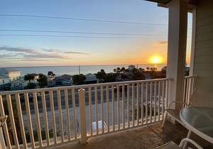Remodeled 3 BR/2BA condo steps to the beach! Sunset views and private garage.