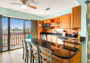 Resort condo near beach with private balcony, WiFi, pool, tennis & dock