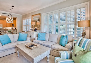 Spacious condo just steps to the private beach, heated pool, hot tub, gym!