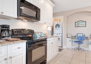 Spacious family condo with large balcony & shared pool and hot tub