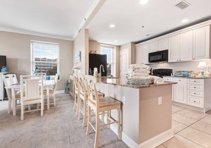 Spacious family condo with large balcony & shared pool and hot tub