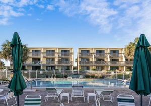 This beautifully remodeled beachfront town home Villa.